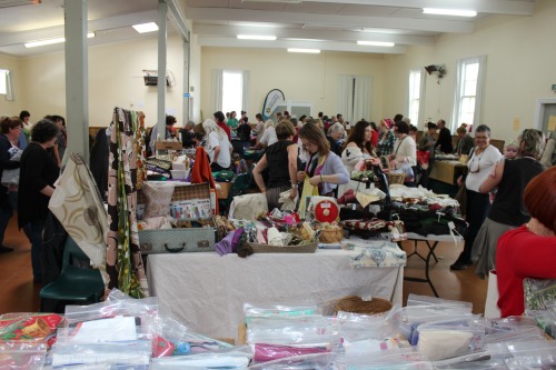 A happy room full of fabric lovers
